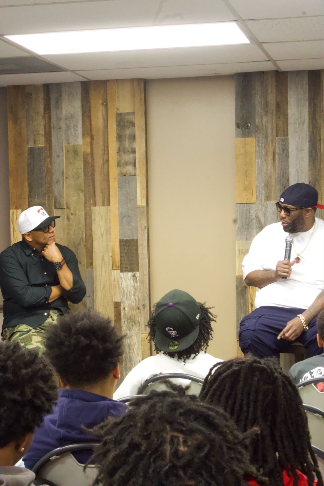 Michael "Killer Mike" Render speaking to young men during a Next Level Boys Academy Saturday class